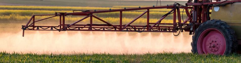 Roundup Side Effects; Roundup Weed Killer Side Effects; Farm equipment spraying crops causing Roundup side effects like non-Hodgkin’s Lymphoma