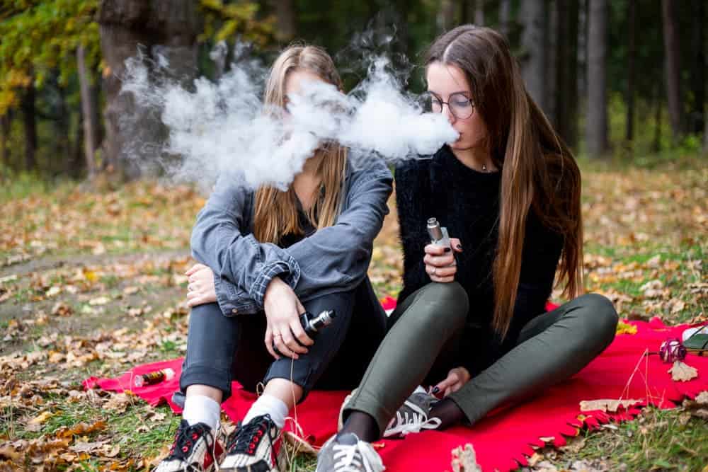 teens vaping e-cigarette